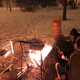 Some homeless people in Chicago attempting to stay warm.